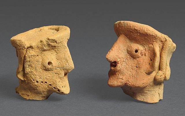 Ancient figurines of people found at Tel Motza (photo credit: Clara Amit/courtesy of IAA)