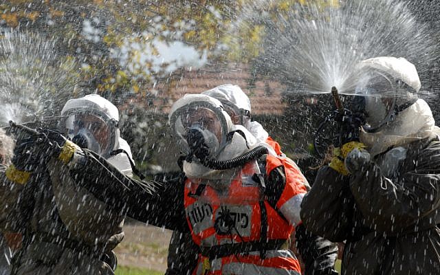 IDF Home Front Command soldiers take part in a 2011 defense drill simulating a chemical attack (Gili Yaari/Flash 90)