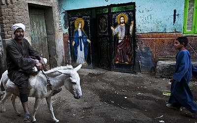 A man rides on a donkey in the village of El-Aziyah near the southern Egyptian city of Assiut on Tuesday. (Illustrative photo: AP/Petr David Josek)