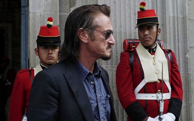 Actor Sean Penn leaves Bolivia's presidential palace after meeting with Evo Morales, whom he's pressed for Ostreicher's freedom. (Juan Karita/AP)