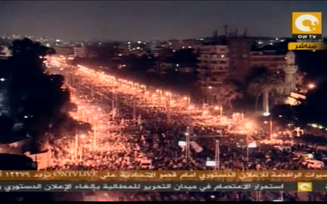 Thousands of protesters congregate in Cairo near the presidential palace on Tuesday. (photo credit: image capture from ONTV)