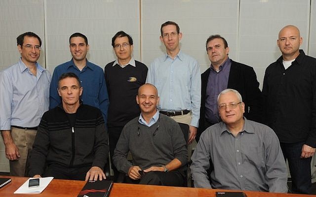 Featured in the photo are the heads of start-ups acquired by Broadcom in Israel over the last decade, along with Dr. Shlomo Markel (back row, third from left)  (Photo credit: Courtesy)