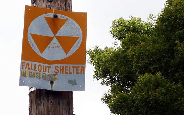 A sign pointing at a nuclear shelter (illustrative photo credit: CC-BY-SA un_cola/Flickr)