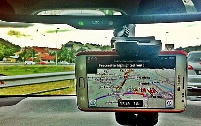 An Instagram color-corrected photo of a driver using Waze in the Philippines. (photo credit: CC-BY raramaurina,Flickr)