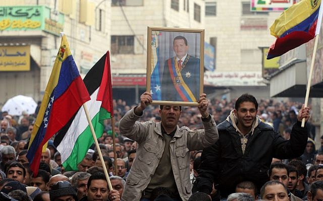 Venezuelan flags and portraits of Hugo Chavez feature prominently at a demonstration in Ramallah against Operation Cast Lead, Jan 9, 2009 (photo credit: Issam Rimawi/Flash 90)