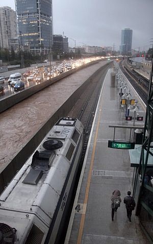 Heavy flooding from the Ayalon River forced the closure of the Ayalon Highway, in Tel Aviv, on Tuesday, Jan 8 (photo credit: Flash90)