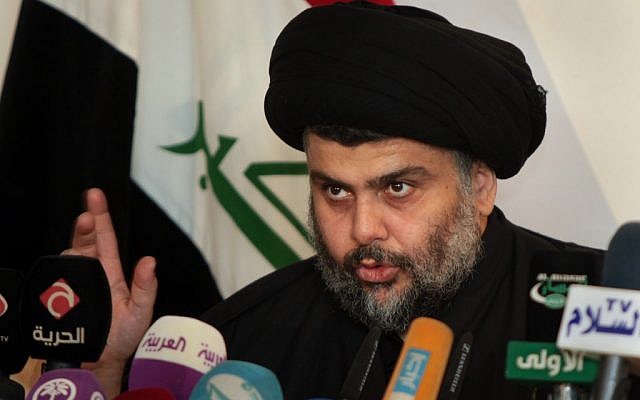 Shiite cleric Muqtada al-Sadr speaks during a press conference in the Shiite holy city of Najaf, 100 miles (160 kilometers) south of Baghdad, Iraq, Tuesday, Jan 1, 2013 (AP/Alaa Al-Marjani)