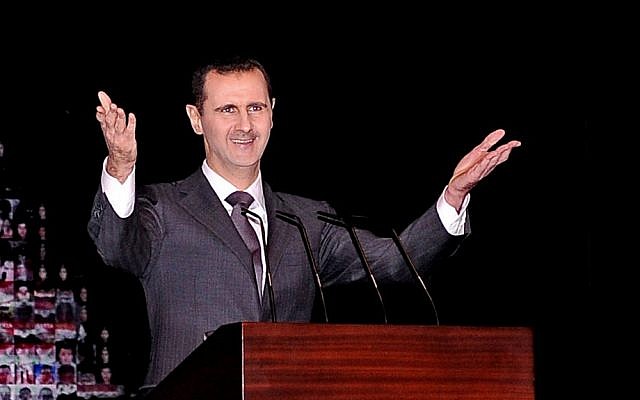 Syrian President Bashar Assad gestures as he speaks at the Opera House in central Damascus, Syria, in January (photo credit: AP/SANA)