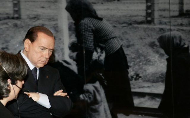 Silvio Berlusconi visits the Yad Vashem Holocaust memorial museum in Jerusalem, February, 2010 (photo credit: Abir Sultan/Flash90)