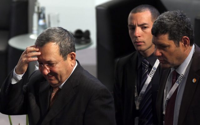 Defense Minister Ehud Barak, left, arrives at the International Security Conference in Munich, southern Germany, Saturday, Feb. 2, 2013. (photo credit: AP/Matthias Schrader)