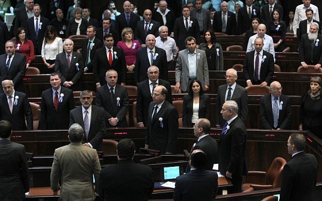 MK's sing the national anthem during the opening session of Israel's 19th Knesset on Tuesday, February 5 (photo credit: Miriam Alster/Flash90)