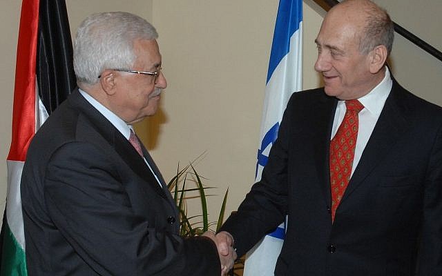 Then prime minister Eud Olmert shakes hands with Palestinian Authority President Mahmoud Abbas in Jerusalem, in 2008 (photo credit: Moshe Milner/GPO/Flash90)