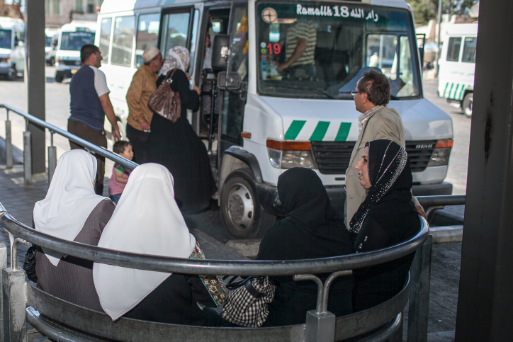 Palestinians board a bus to Ramallah from the central bus station in East Jerusalem (photo credit: Noam Moskowitz)