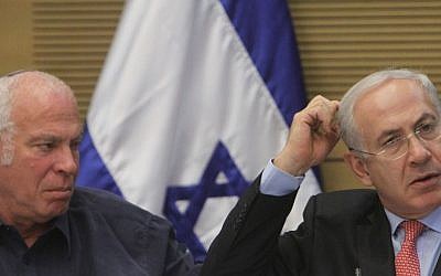 Uri Ariel (left) with Benjamin Netanyahu in the Knesset in 2012 (photo credit: Miriam Alster/Flash90)