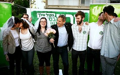 Meretz MK Nitzan Horovitz (C) and members of the Meretz party seen acting out a gay marriage outside the Rabbinical Court in Tel Aviv (photo credit: Flash90)