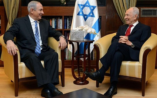 Israel's President Shimon Peres meets with Likud-Beytenu leader and Prime Minister Benjamin Netanyahu in Peres's office in Jerusalem on March 16, 2013. Netanyahu met with Peres to inform the president he has formed a coalition with Yesh Atid, Jewish Home and the Hatnua party. (Photo credit: Kobi Gideon / GPO/FLASH90)