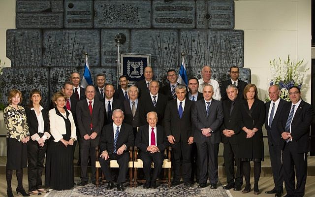 The new Cabinet posing for a photo with President Shimon Peres, March 18. (photo credit: Yonatan Sindel/Flash90)