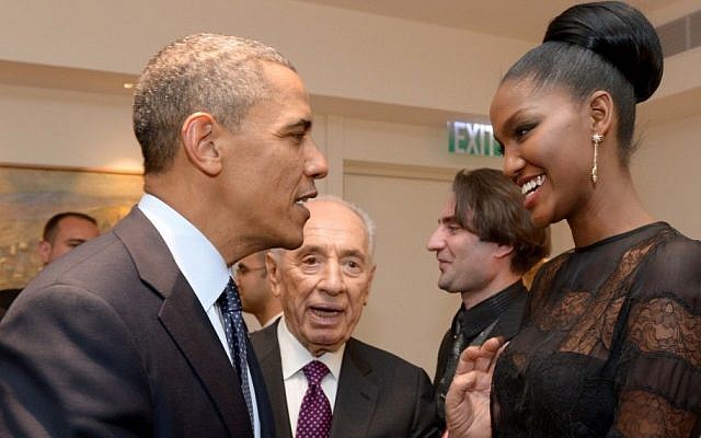 President Barack Obama shakes hands with Yityish Aynaw, a 21-year old Ethiopian-Israeli who won Israel's Miss Israel national beauty pageant, at the President's Residence in Jerusalem on March 21, 2013. (Photo credit: Avi Ohayon/GPO/FLASH90)
