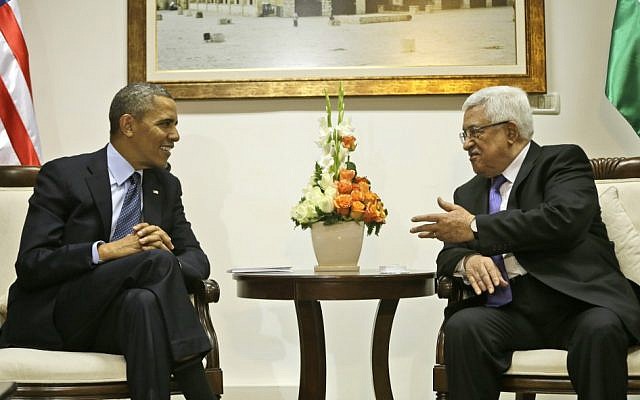 US President Barack Obama, left, listens to Palestinian President Mahmoud Abbas during a meeting at the Muqata Presidential Compound in the West Bank city of Ramallah, last March (photo credit: AP/Pablo Martinez Monsivais/File)
