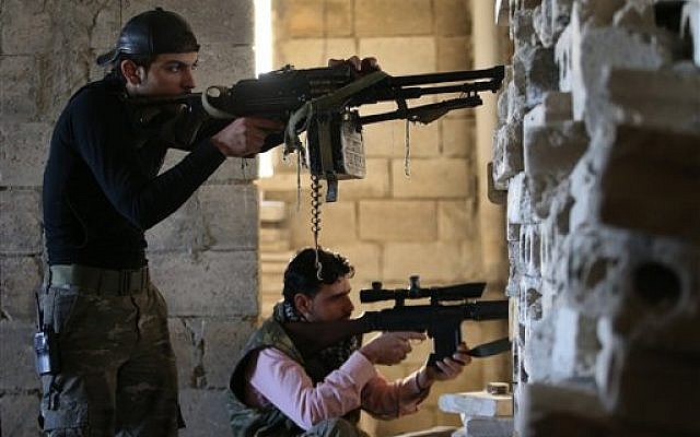 Free Syrian Army soldiers in Idlib province, Syria, in February (photo credit: AP/Hussein Malla)