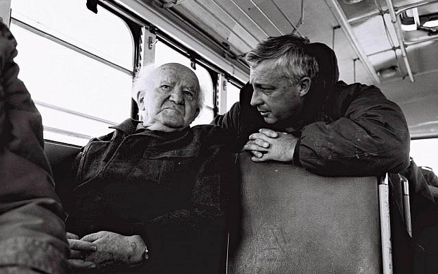 David Ben Gurion (left) and then-major general Ariel Sharon during a bus ride along the Israeli army positions on the Egyptian border in 1973. (IDF/Flash90)
