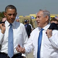 POTUS and Bibi with blue ties and suit jackets slung over their shoulders (photo credit: Avi Ohayoun/Flash 90)