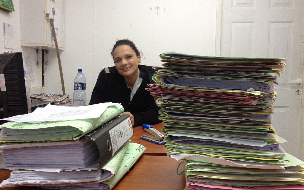 Lt. Arin Shaabi in her folder-filled office (Photo credit: Mitch Ginsburg/ Times of Israel)