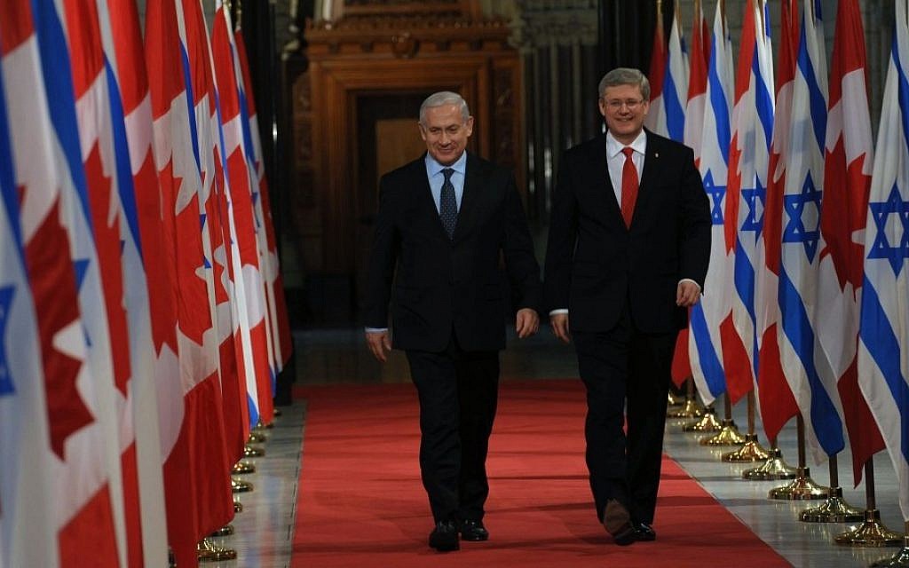 Prime Minister Benjamin Netanyahu with former Canadian Prime Minister Stephen Harper (right) in Ottawa, Canada, March 2, 2012 (photo credit: Amos Ben Gershom/GPO/Flash90)