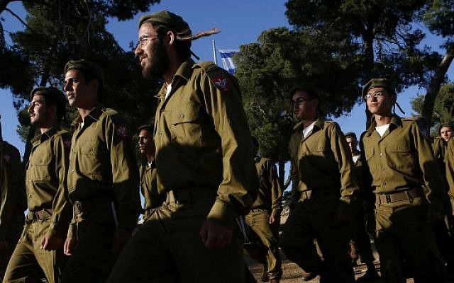 Illustrative. Religious Jewish soldiers attend a swearing-in ceremony on May 26, 2012. (Miriam Alster/FLASH90)