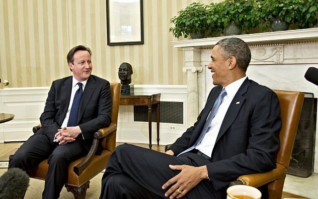 US President Barack Obama  welcomes British Prime Minister David Cameron in the Oval Office in May 2013. (photo credit: AP/J. Scott Applewhite)