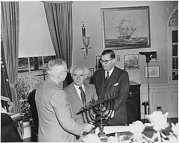 Abba Eban and David Ben-Gurion light a menorah with President Truman in the Oval Office, May 8, 1951. (photo courtesy of National Archives and Records Administration, Office of Presidential Libraries. Harry S. Truman Library)