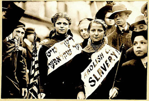 "ABOLISH CHILD SLAVERY!!" in English and Yiddish, probably taken during May 1, 1909 labor parade in New York City. Jewish American women have often been at the forefront of social change. (Photo credit: George Grantham Bain Collection, Library of Congress). 