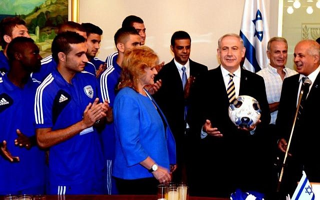 Prime Minister Benjamin Netanyahu meets with the Israel under-21 soccer team ahead of this week's European Championship. (Photo credit: Moshe Milner/ GPO/Flash 90.)