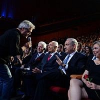 Illustrative: Israeli singer Shlomo Artzi sings in front of President Shimon Peres (C) Prime Minister Benjamin Netanyahu and former US President Bill Clinton (L) at a celebration in honor of Peres's 90th birthday, in Jerusalem, June 18, 2013. (Kobi Gideon/GPO/Flash90)