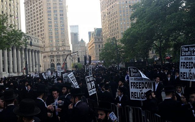 Thousands of ultra-Orthodox Jews gather in New York to protest the conscription of yeshiva students into the IDF (photo credit: JTA)