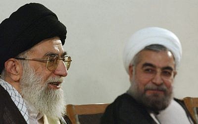Supreme Leader Ayatollah Ali Khamenei, left, speaks during a meeting with Hasan Rouhani in Tehran, Iran, on Sunday, June 16, 2013 (photo credit: AP/Office of the Supreme Leader)
