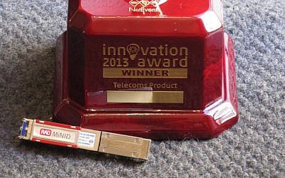RAD Data's MiNID device, together with its innovation award (Photo credit: Courtesy)