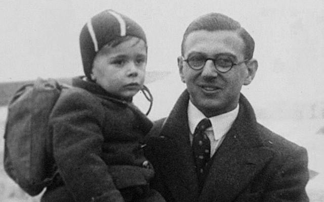 A young Nicholas Winton with a rescued child. (photo credit: Courtesy of Menemsha Films)