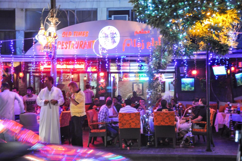 Cafes cater to people who want to smoke shisha, or water pipes, and indulge in treats late into the night (photo credit: Michal Shmulovich/Times of Israel)