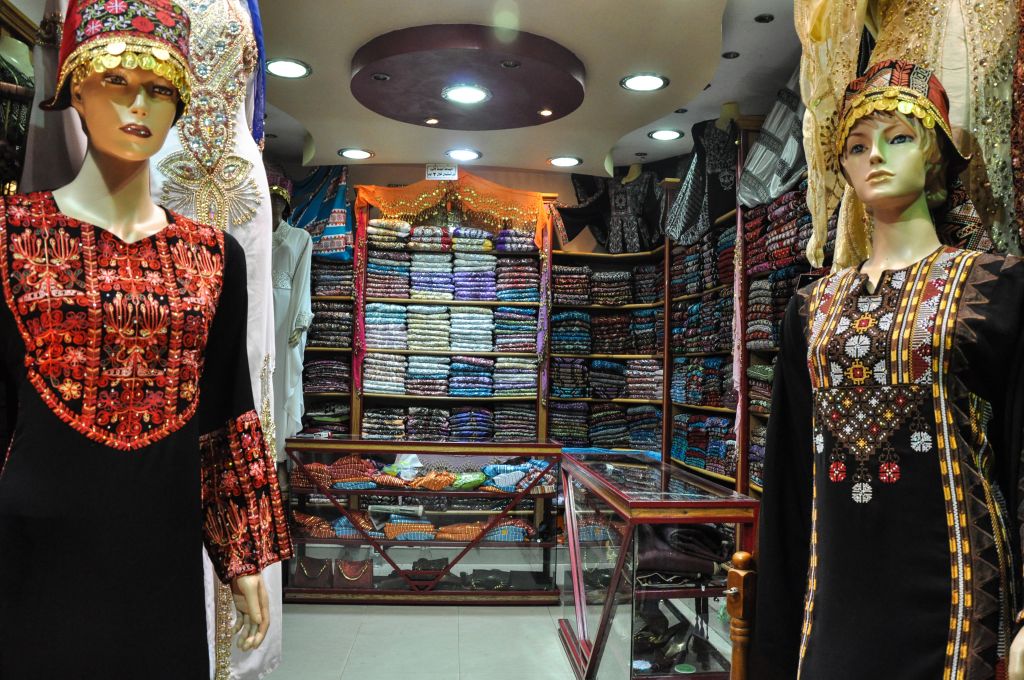 Fancy dresses for weddings and other occasions at a store in downtown Amman (photo credit: Michal Shmulovich/Times of Israel)