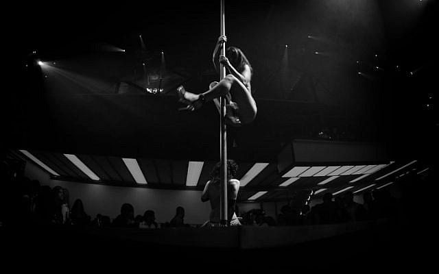A dancer performs at a Tel Aviv strip club (photo credit:  Boaz Oppenheim/Flash90)