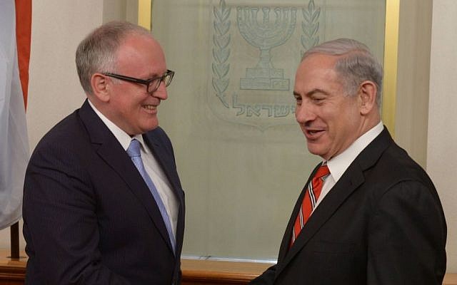 PM Benjamin Netanyahu, right, with Dutch FM Frans Timmermans in Jerusalem on June 17, 2013. (photo credit: Amos Ben Gershom/GPO/Flash90)