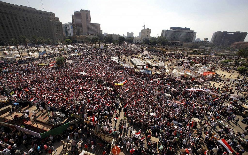 Opponents of Egypt's Islamist president Mohammed Morsi at a protest in Tahrir Square in Cairo, Egypt, on Wednesday. (photo credit: AP/Amr Nabil)