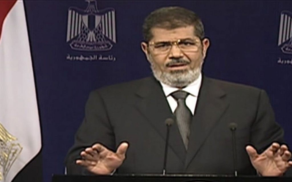 Egyptian President Mohammed Morsi addresses the nation in a televised speech on Tuesday, July 2. (photo credit: AP Photo/Egyptian State Television)