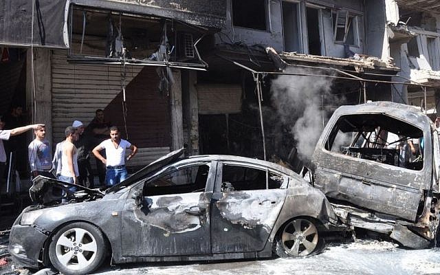 Illustrative photo of a car bombing in Syria (photo credit: AP/SANA)