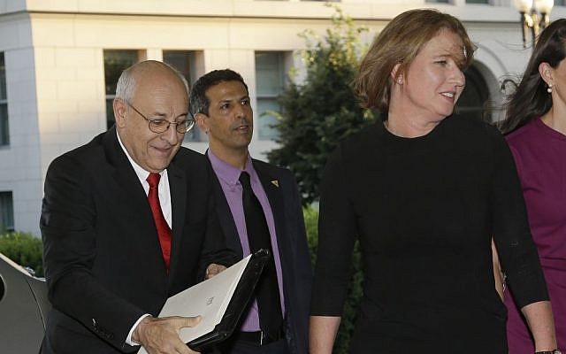 Justice Minister Tzipi Livni, right, and Yitzhak Molcho, arrive at the State Department in Washington, Monday, July 29, 2013. (photo credit: AP Photo/Pablo Martinez Monsivais)
