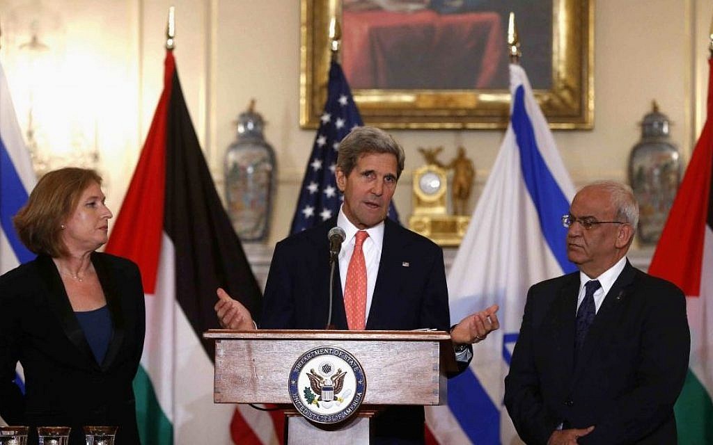Secretary of State John Kerry stands with Justice Minister and chief negotiator Tzipi Livni, left, and Palestinian chief negotiator Saeb Erekat, after the resumption of Israeli-Palestinian peace talks, Tuesday, July 30, 2013, at the State Department in Washington. (photo credit: AP/Charles Dharapak)