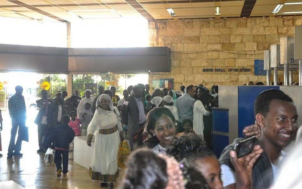 Ethiopian Jews being airlifted to Israel in 2013, ending the project that brought 7,500 Falash Mura to Israel over that year. (photo credit: Michal Shmulovich/ToI)