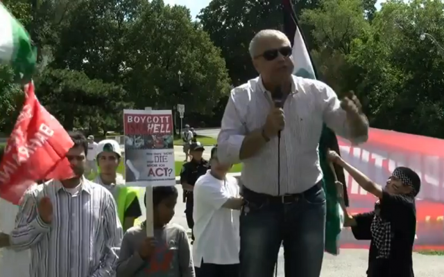 Elias Hazineh speaks during an Al-Quds Day event in Toronto in 2013 (Photo credit: YouTube)