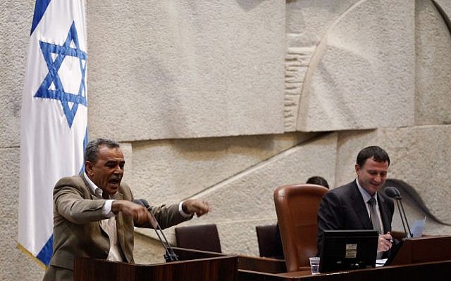Balad Member of Knesset Jamal Zahalke gesticulates while addressing the Knesset plenum  in Jerusalem, July 31, 2013. (Credit: Flash90)